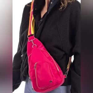 PINK SHOULDER SLING BAG WITH STRIPED STRAP